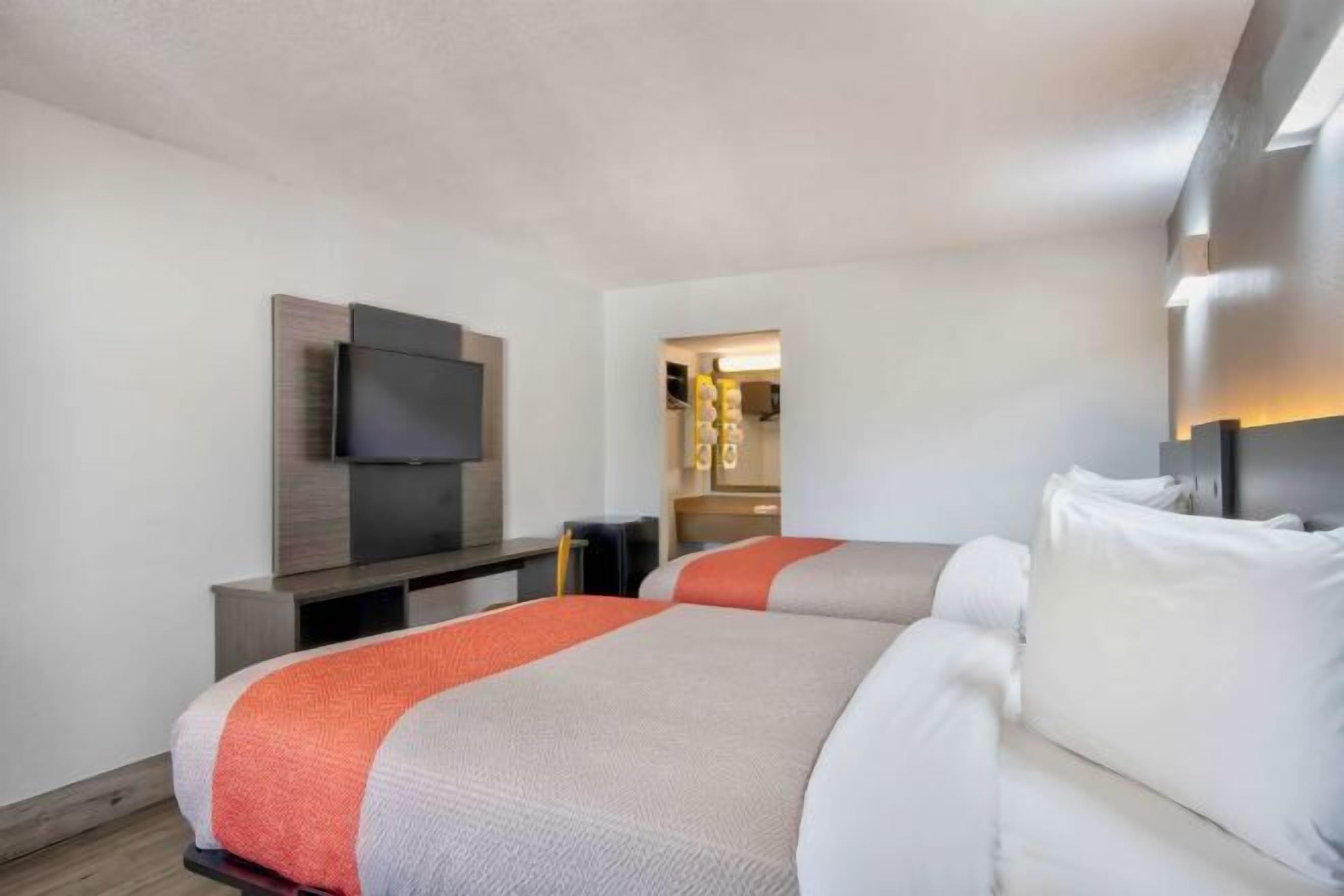 Desk, free WiFi, bed sheets, alarm clocks