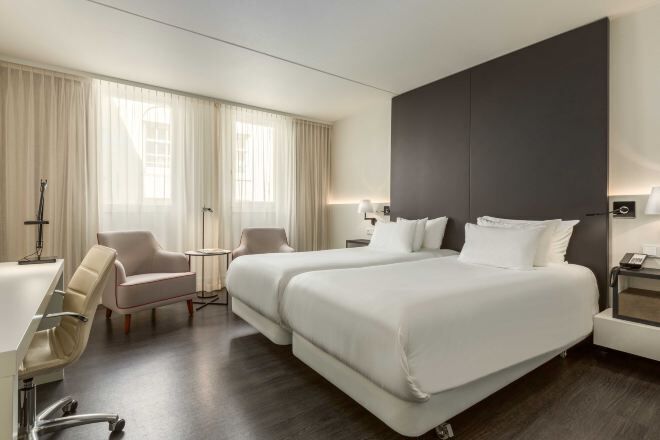 Premium bedding, down comforters, minibar, in-room safe
