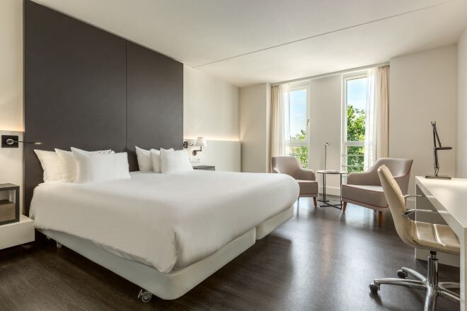 Premium bedding, down comforters, minibar, in-room safe