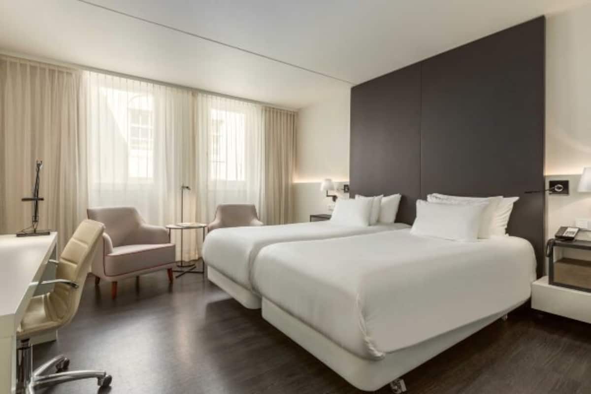 Ropa de cama de alta calidad, edredón y minibar