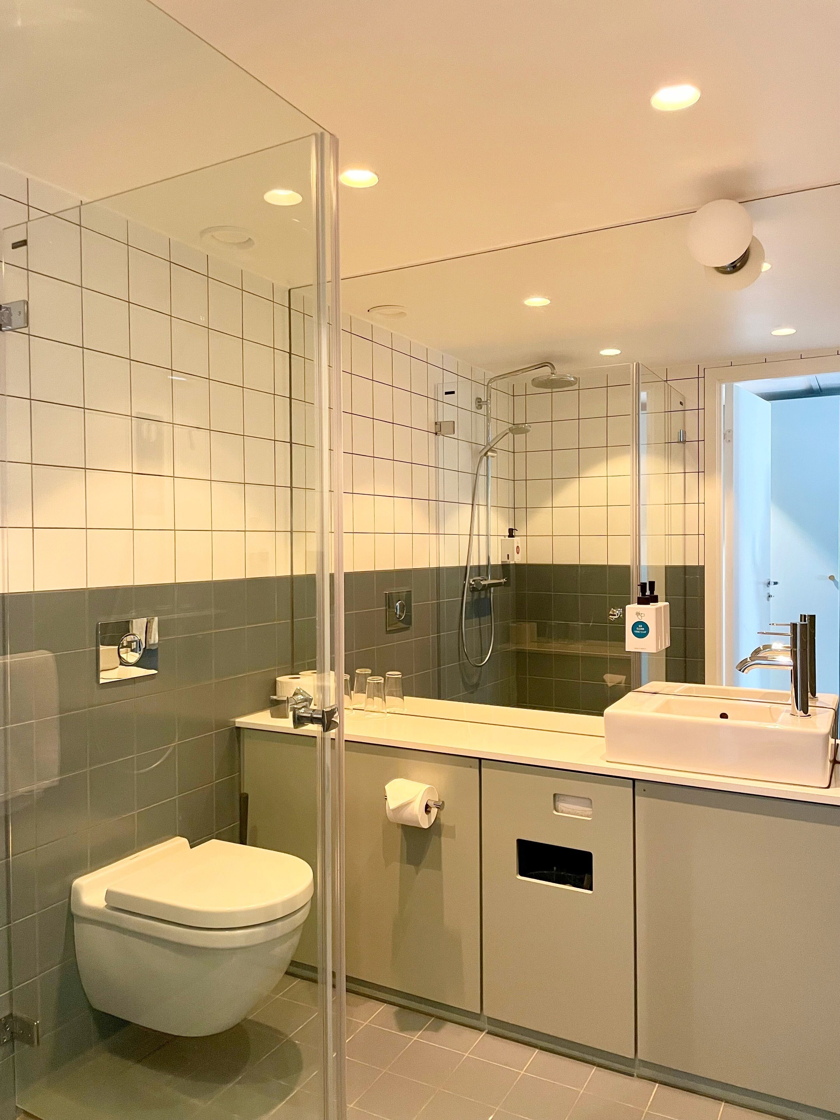 superior double room | bathroom | eco-friendly toiletries, hair dryer, heated floors, towels