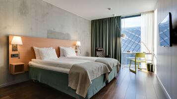 Hypo-allergenic bedding, desk, blackout curtains, iron/ironing board