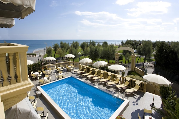 Indoor pool, seasonal outdoor pool, pool umbrellas, sun loungers