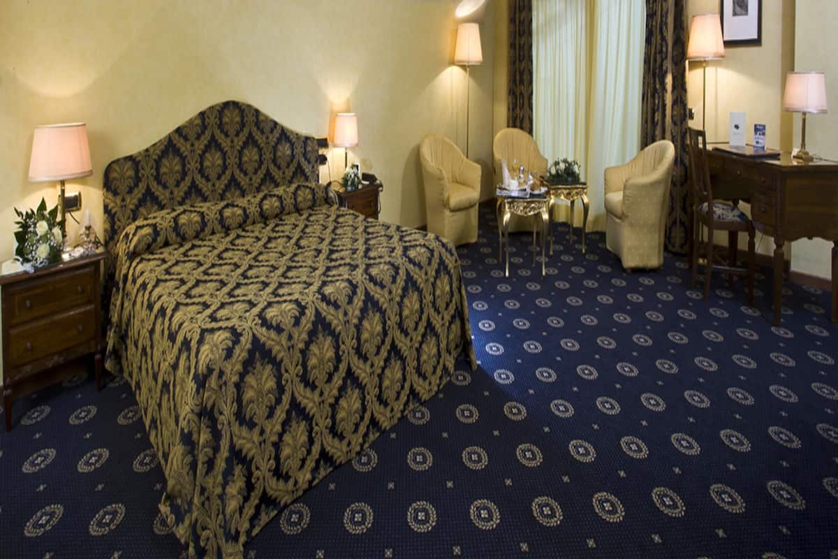Frette Italian sheets, hypo-allergenic bedding, down comforters