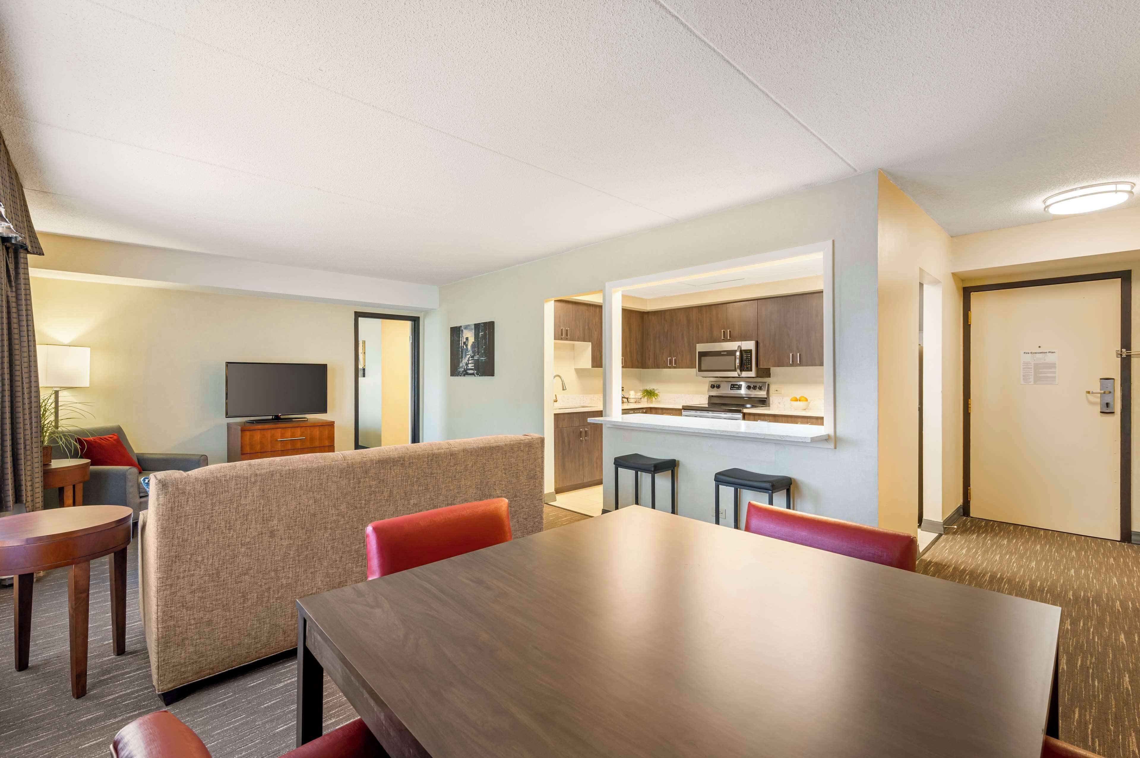 suite, 1 king bed with sofa bed, non smoking, corner (with sofabed) | desk, laptop workspace, iron/ironing board, free cots/infant beds