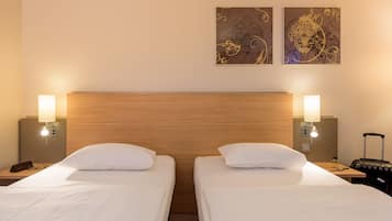 Hypo-allergenic bedding, in-room safe, desk, laptop workspace