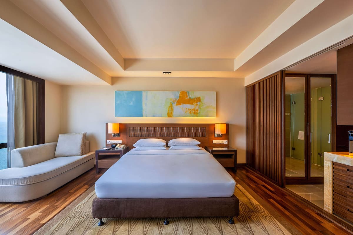 Club Room, 1 King Bed, Sea View | 1 bedroom, in-room safe, desk, iron/ironing board