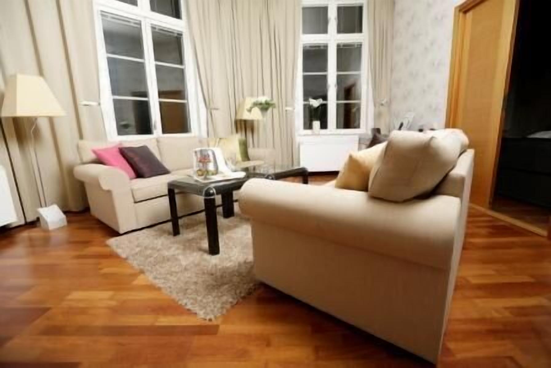 superior double or twin room | living area | flat-screen tv