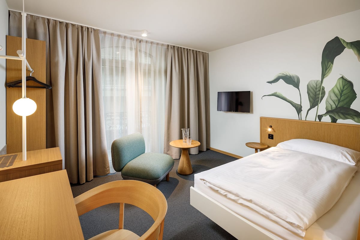 Chambre simple, 1 lit jumeau, vue sur la ville | Literie de qualité, couette en duvet, minibar, coffre-fort