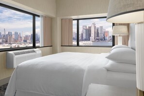 Suite panorámica, 1 cama King size y sofá cama (City View) | 1 habitación, ropa de cama de alta calidad y edredón 