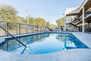 Outdoor pool, open 9 AM to 9 PM, pool umbrellas, pool loungers