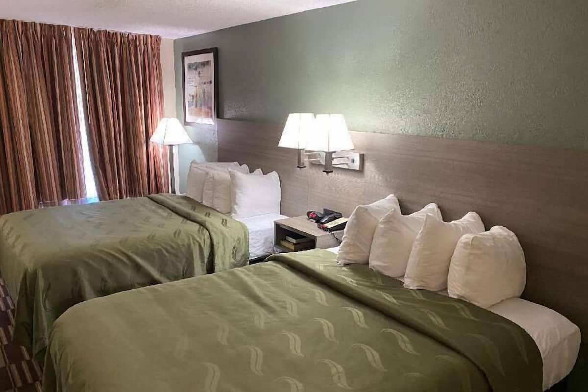 Down comforters, desk, laptop workspace, blackout drapes