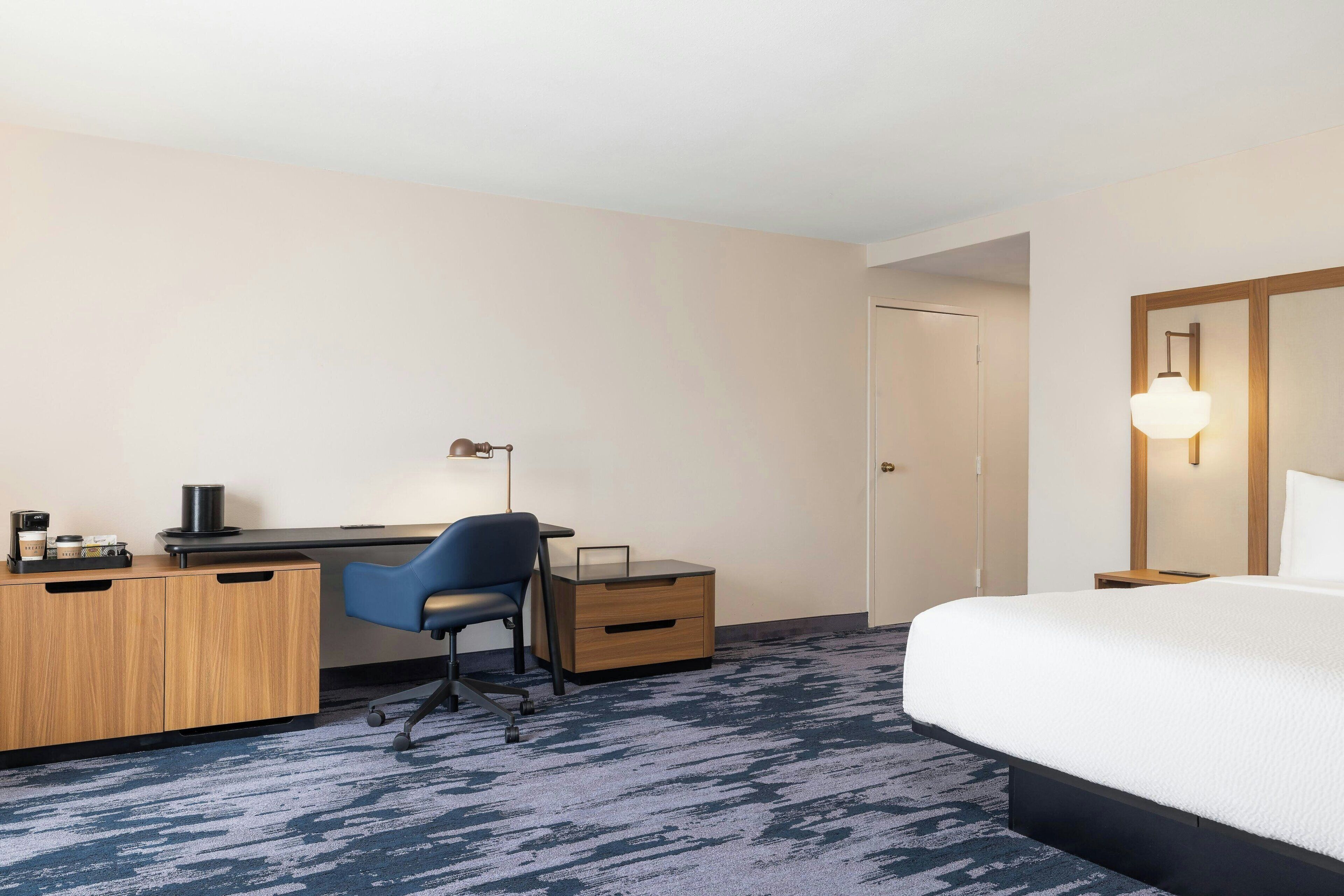 Desk, laptop workspace, iron/ironing board, rollaway beds