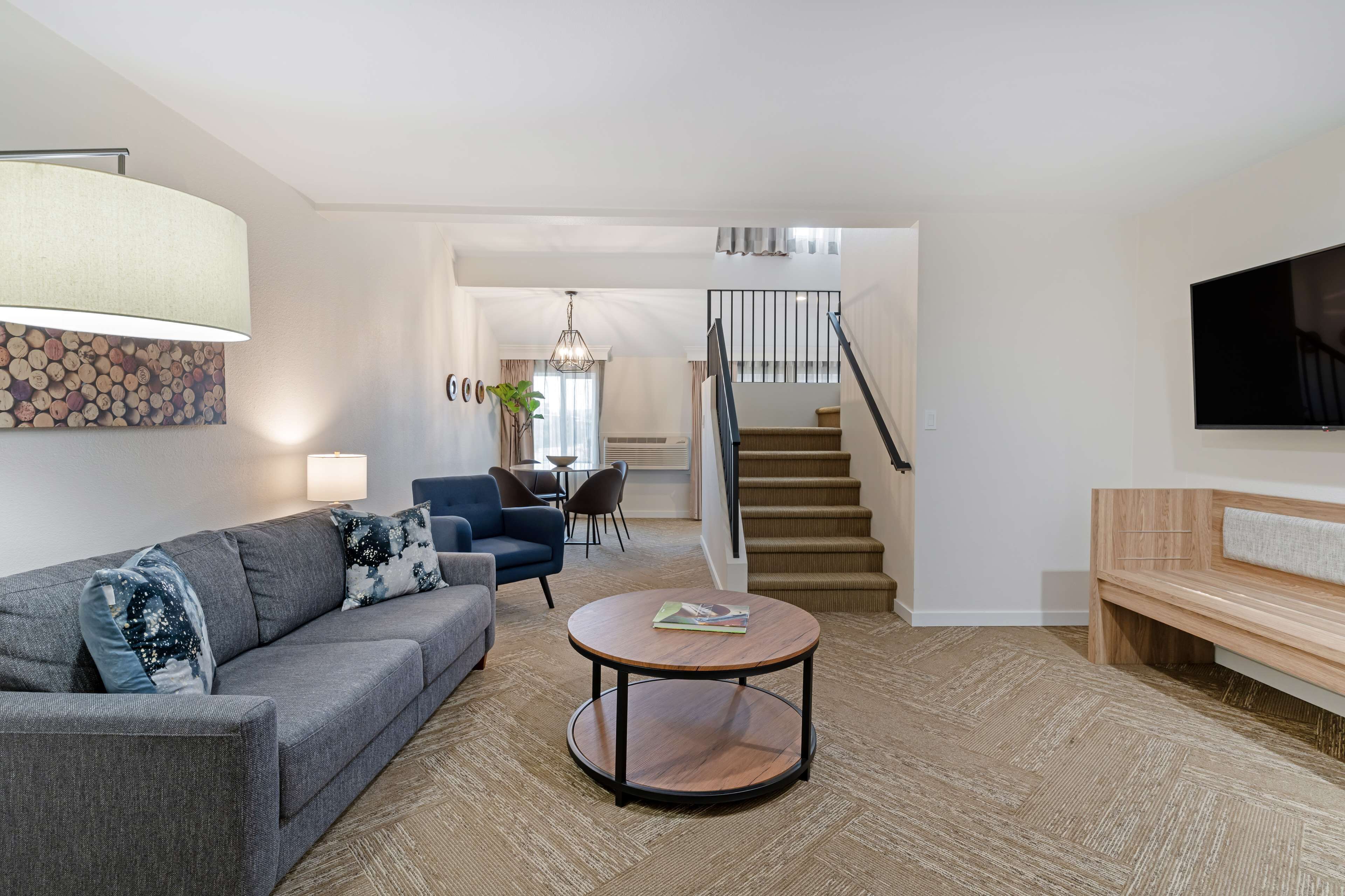 suite, multiple beds, non smoking, refrigerator & microwave (living room;with sofabed) | in-room safe, individually decorated, individually furnished, desk