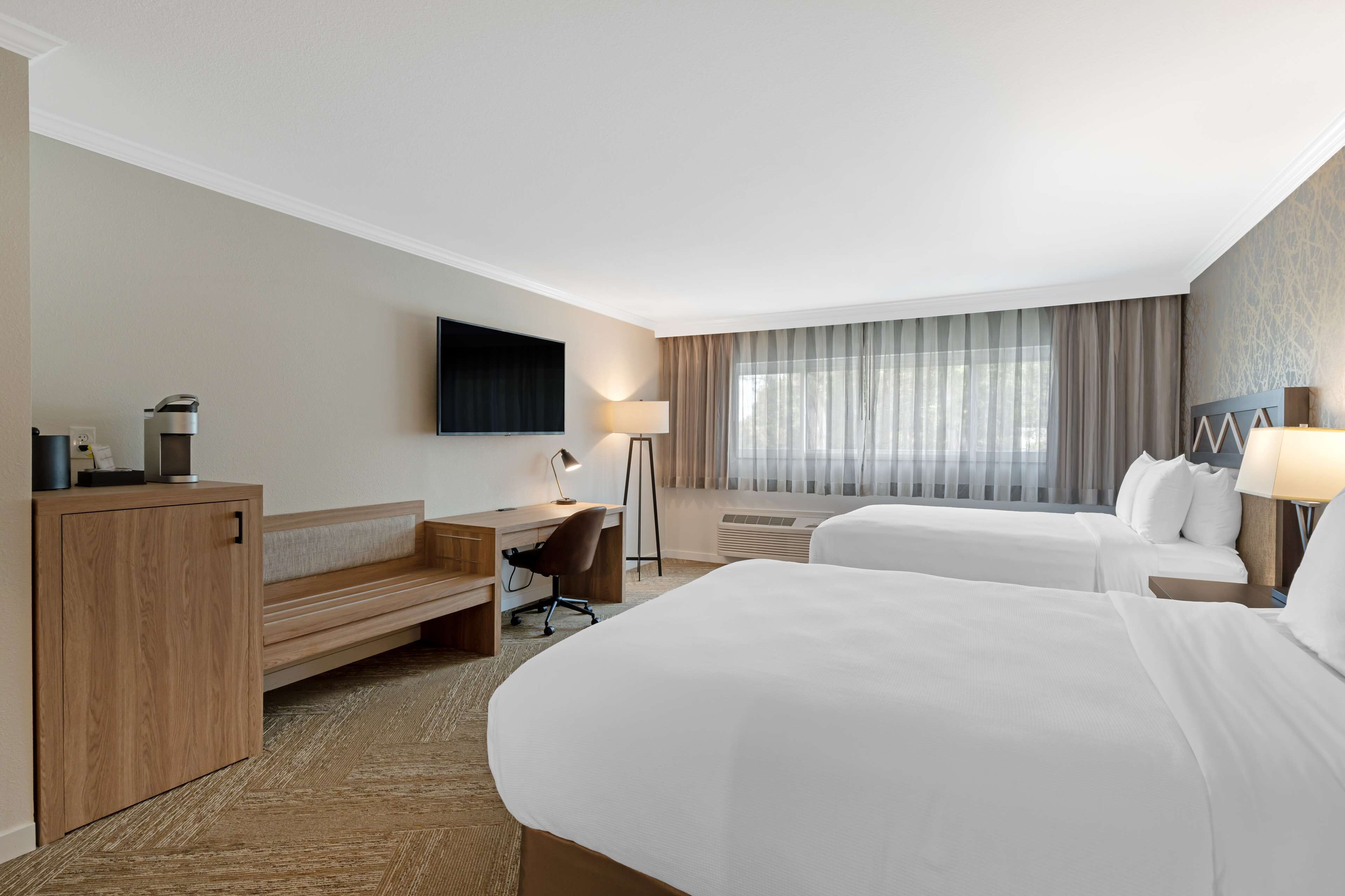 standard room, 2 queen beds, non smoking, refrigerator & microwave (walk-in shower) | in-room safe, individually decorated, individually furnished, desk