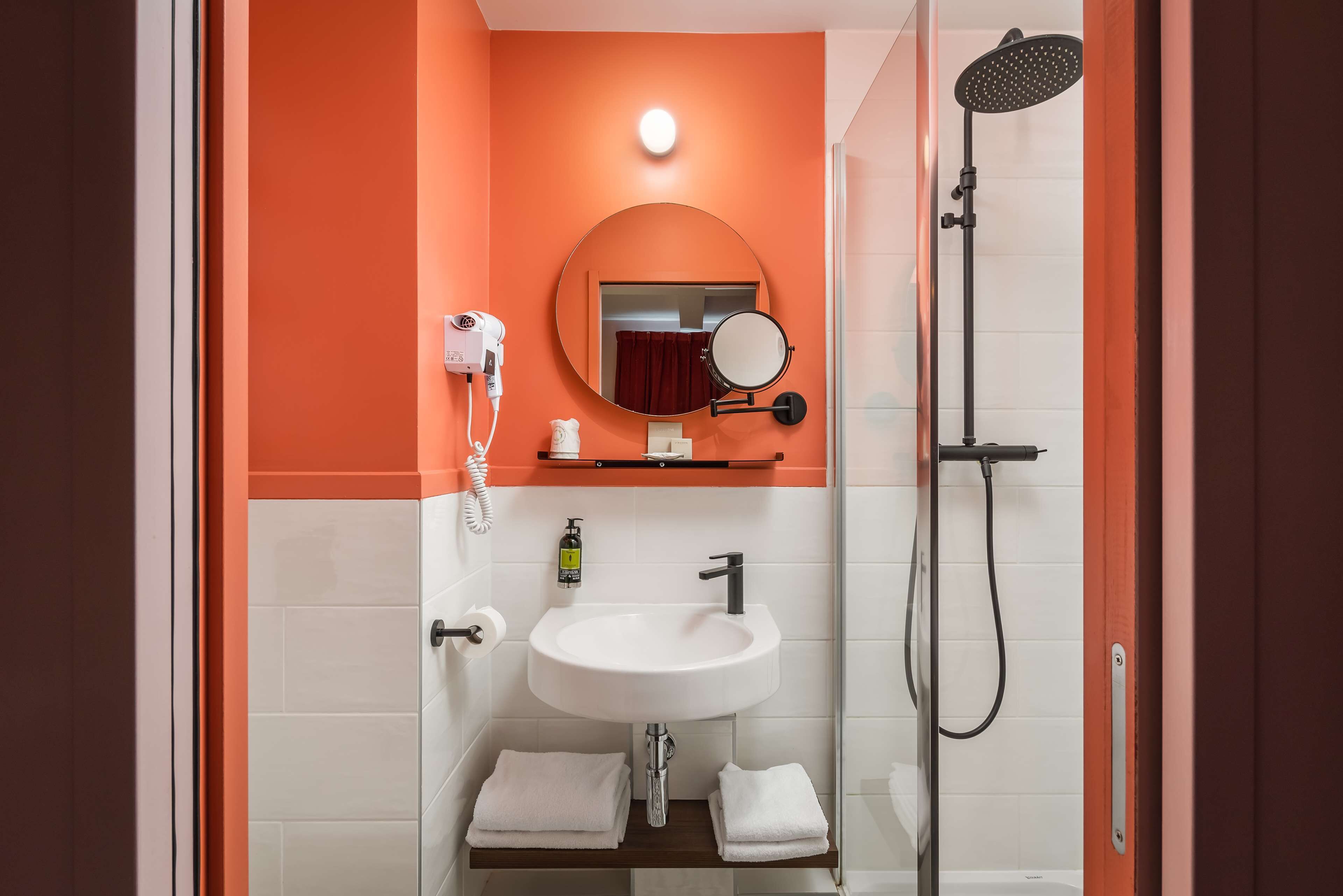 hair dryer, towels, soap, shampoo