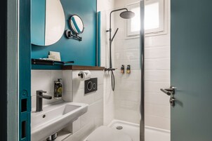 Hair dryer, towels, soap, shampoo