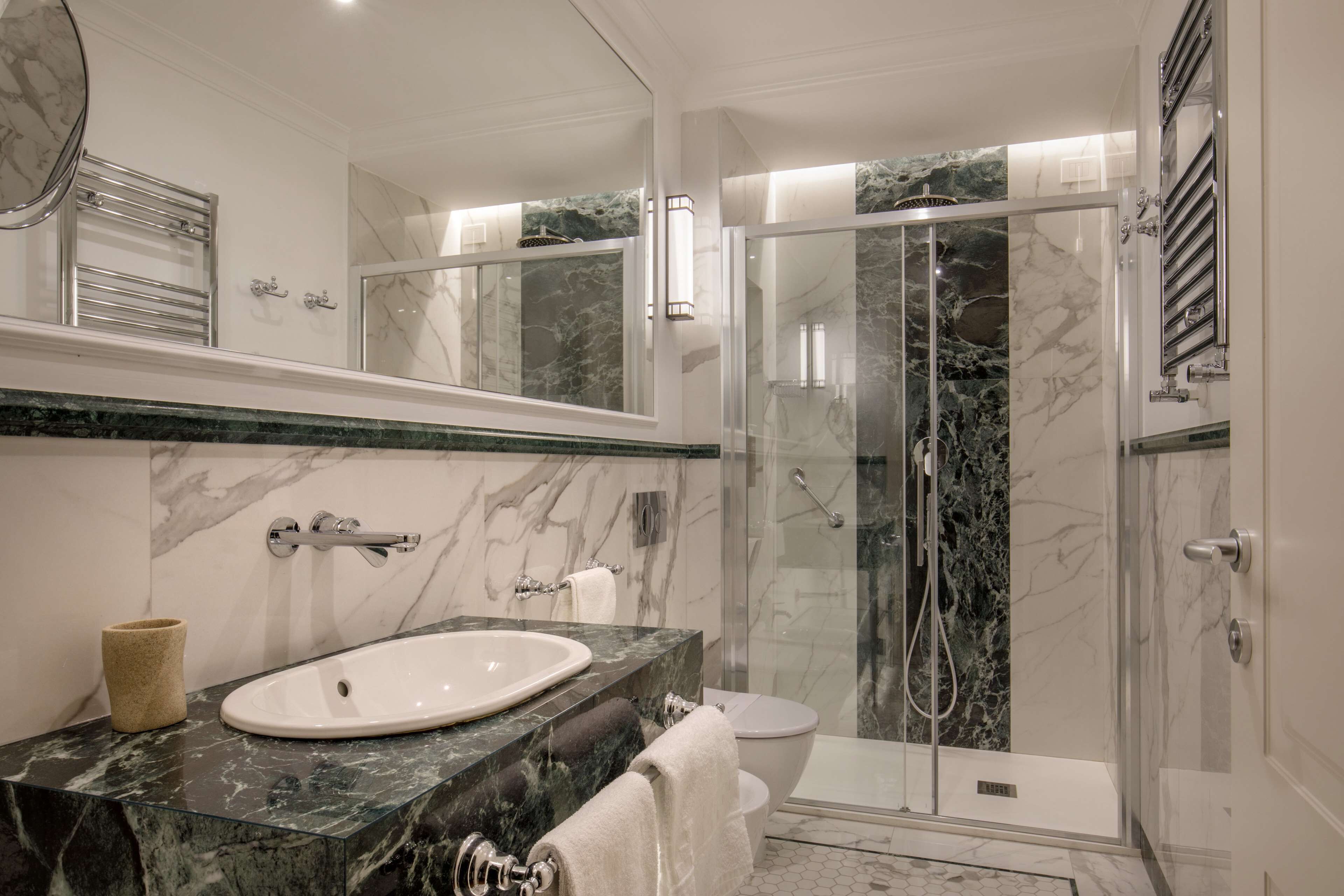 eco-friendly toiletries, hair dryer, slippers, bidet