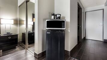 Premium bedding, desk, laptop workspace, blackout curtains