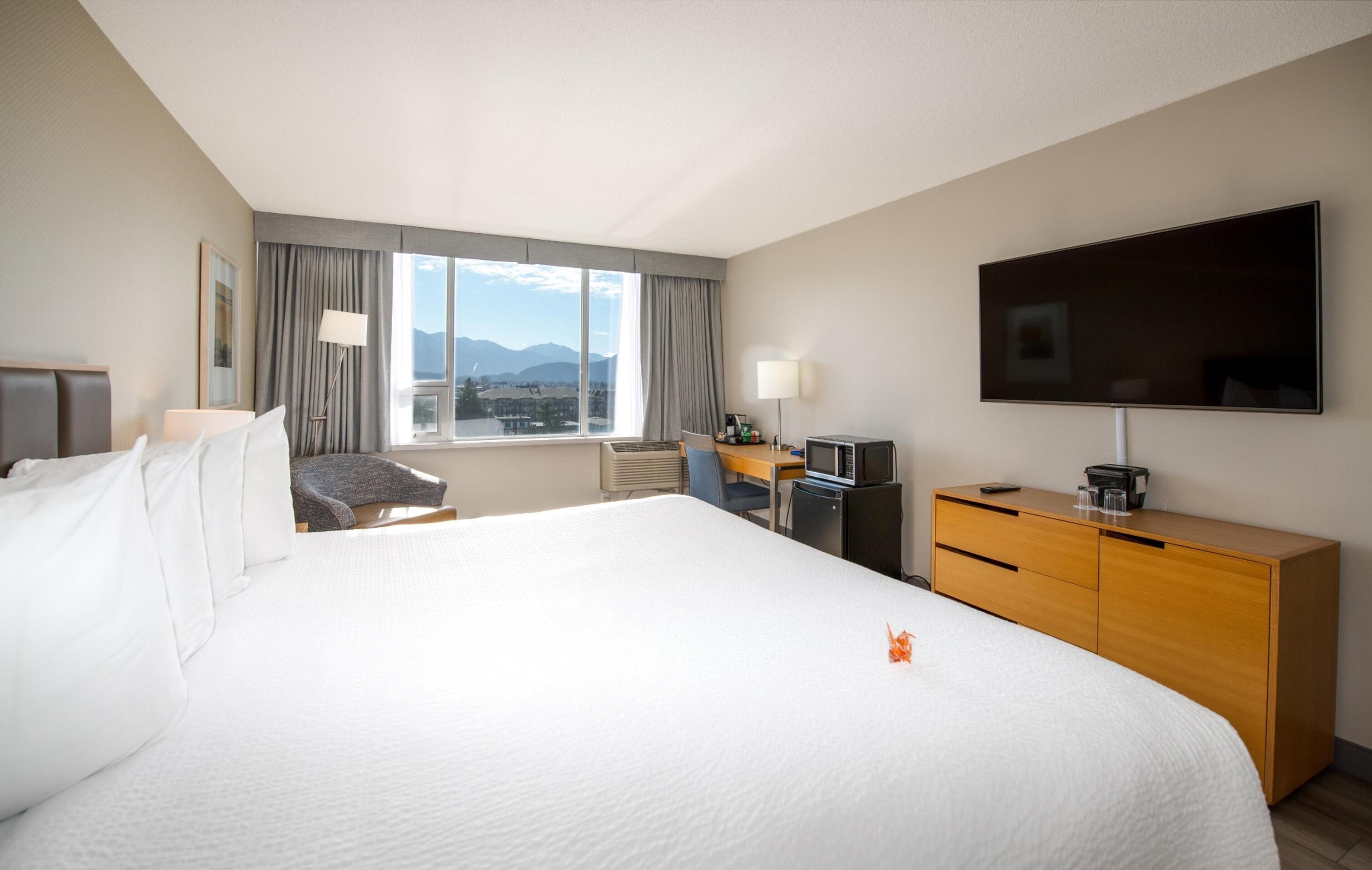 Room, 1 King Bed, Lake View (Coast King with Pond View) | In-room safe, desk, laptop workspace, blackout curtains