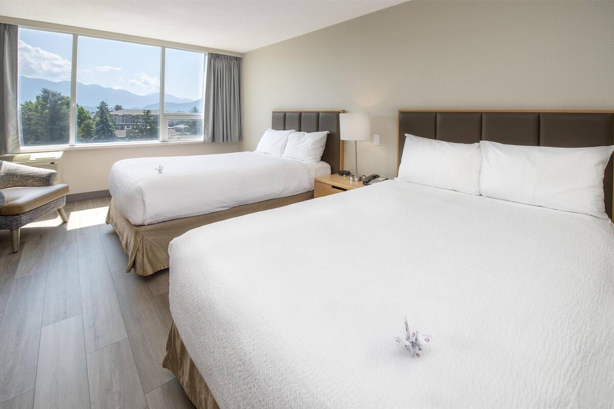 room, 2 double beds, lake view (coast two doubles with pond view) | 1 bedroom, in-room safe, desk, laptop workspace