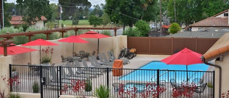 Outdoor pool, pool umbrellas, pool loungers