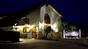 A two-story building with a sign reading "Casa Jai." - Casa Ojai Inn (Ojai)