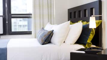 Premium bedding, desk, iron/ironing board, rollaway beds