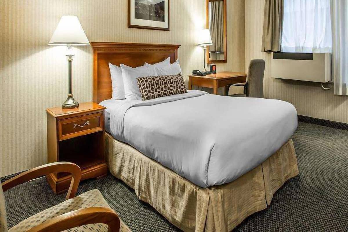 Premium bedding, desk, iron/ironing board, rollaway beds