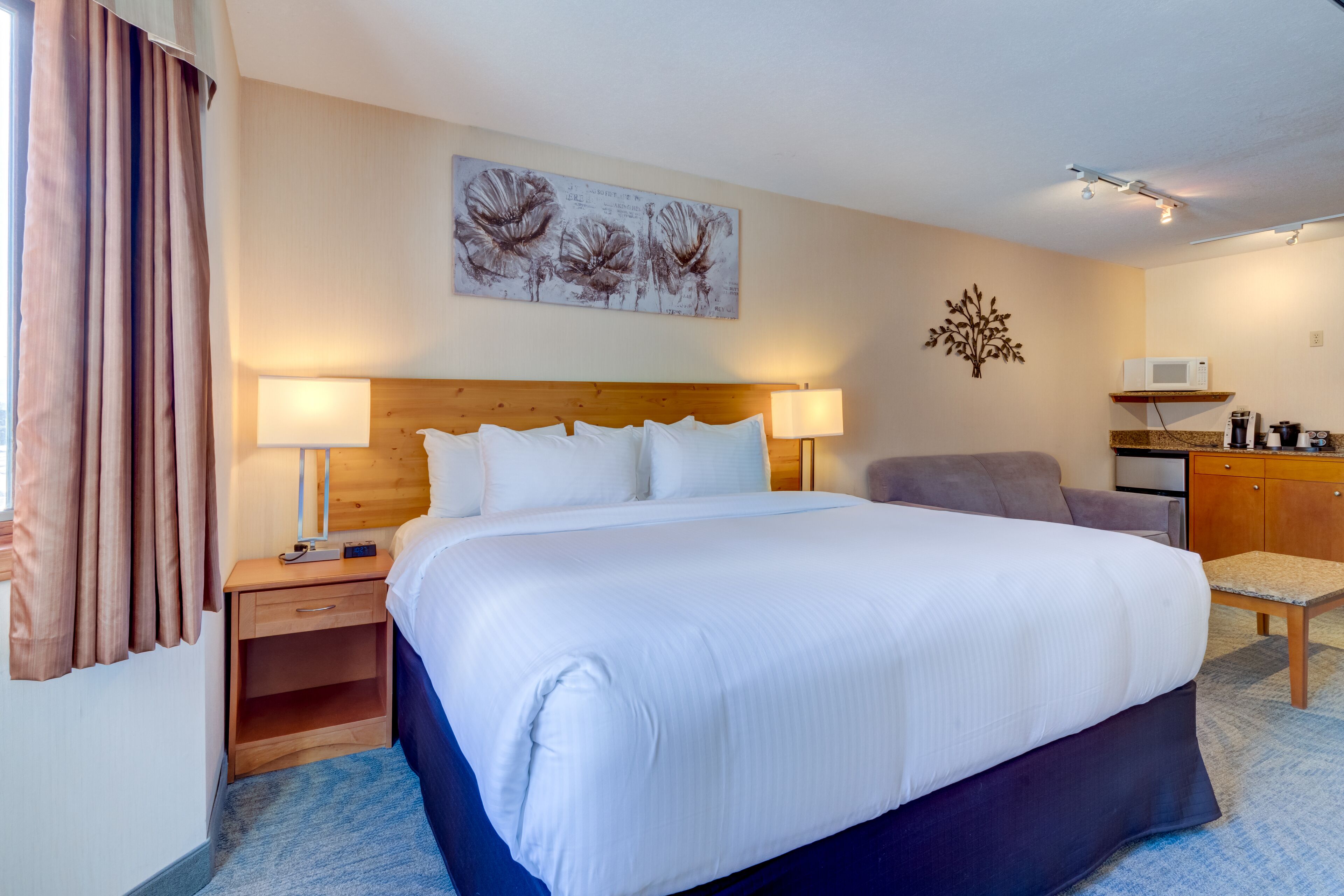 Suíte executiva, 1 quarto | Banheiro | Banheira, produtos de toalete grátis, secador de cabelo 