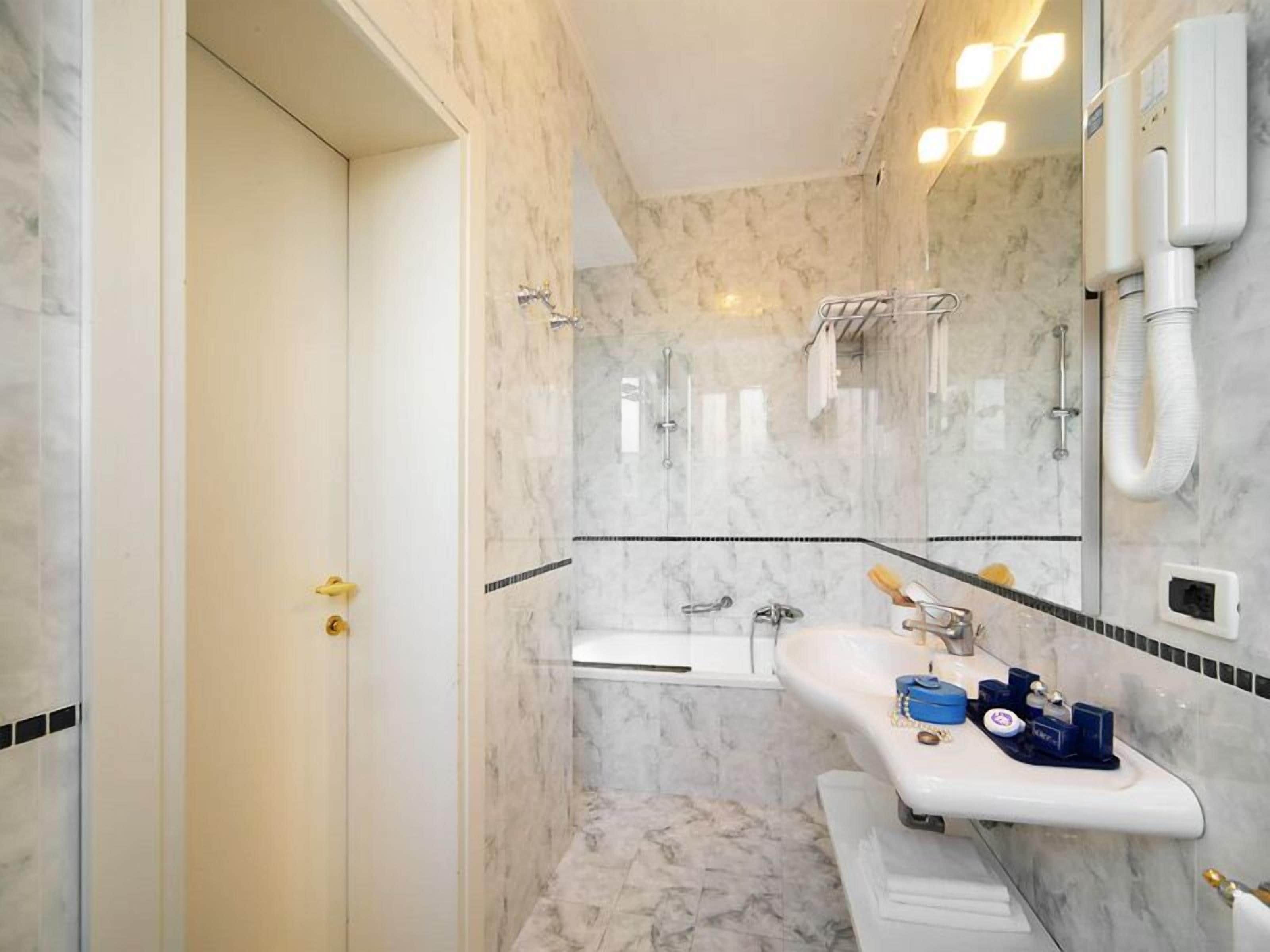 free toiletries, hair dryer, bidet, towels