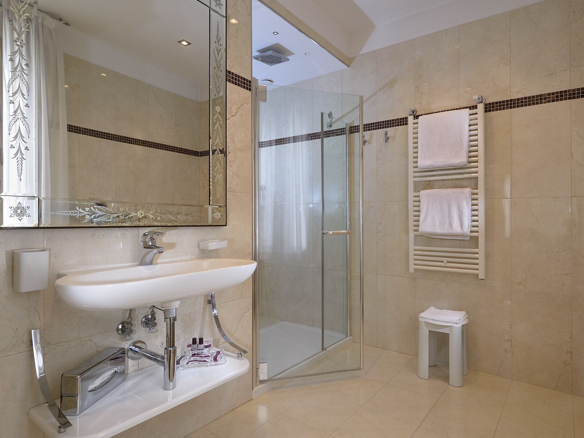 free toiletries, hair dryer, bidet, towels