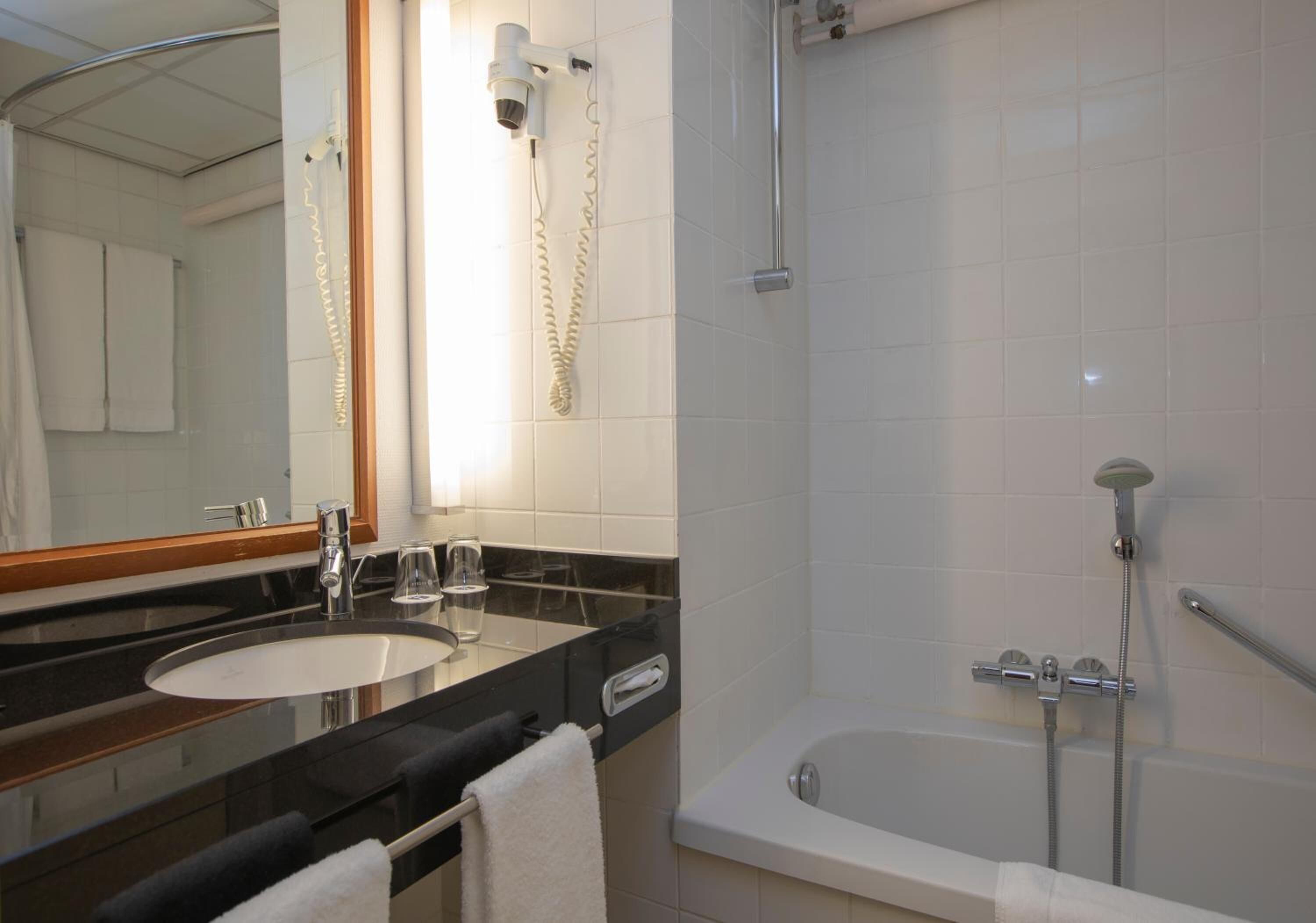 combined shower/bathtub, deep-soaking bathtub, eco-friendly toiletries