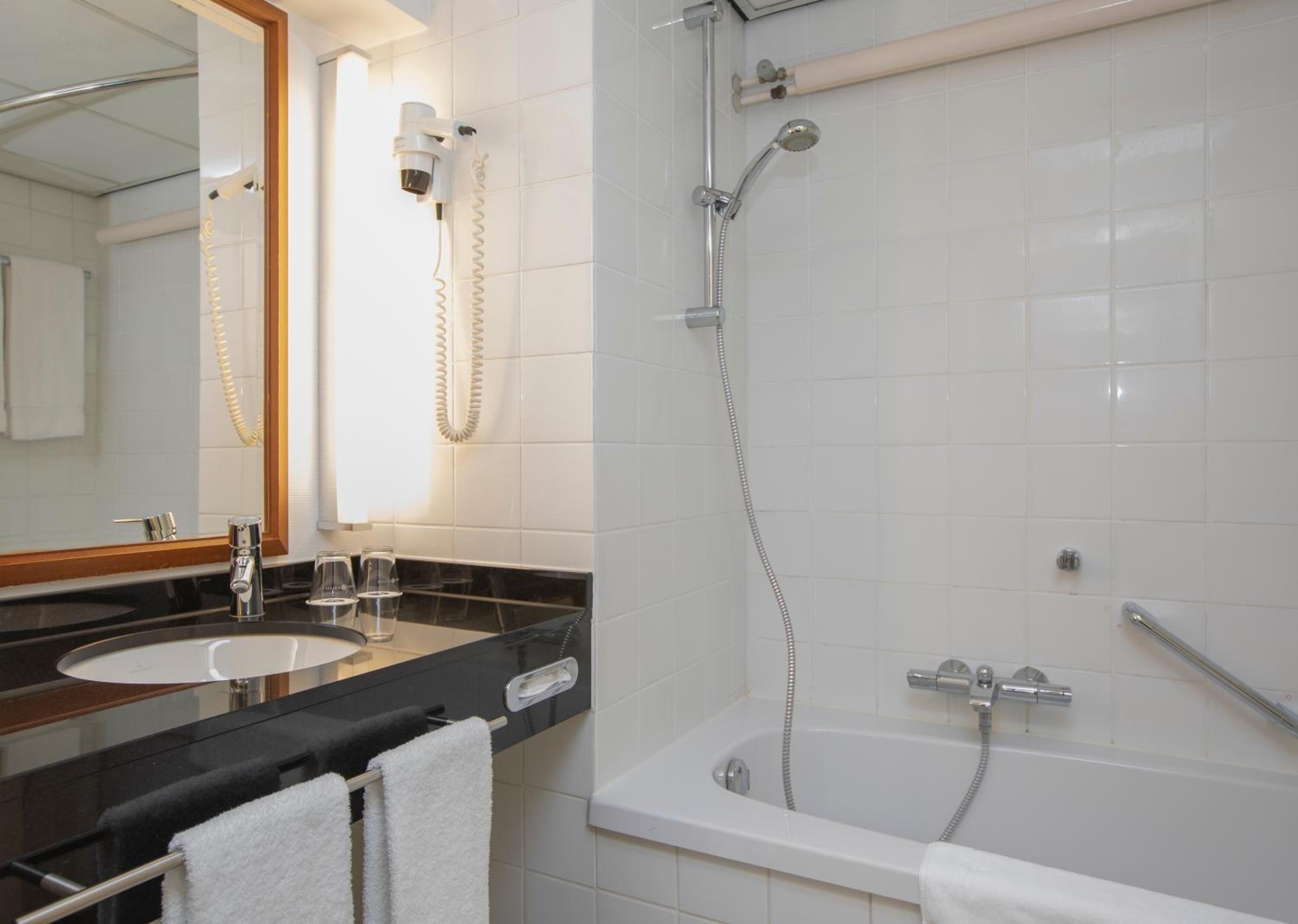 combined shower/bathtub, deep-soaking bathtub, eco-friendly toiletries