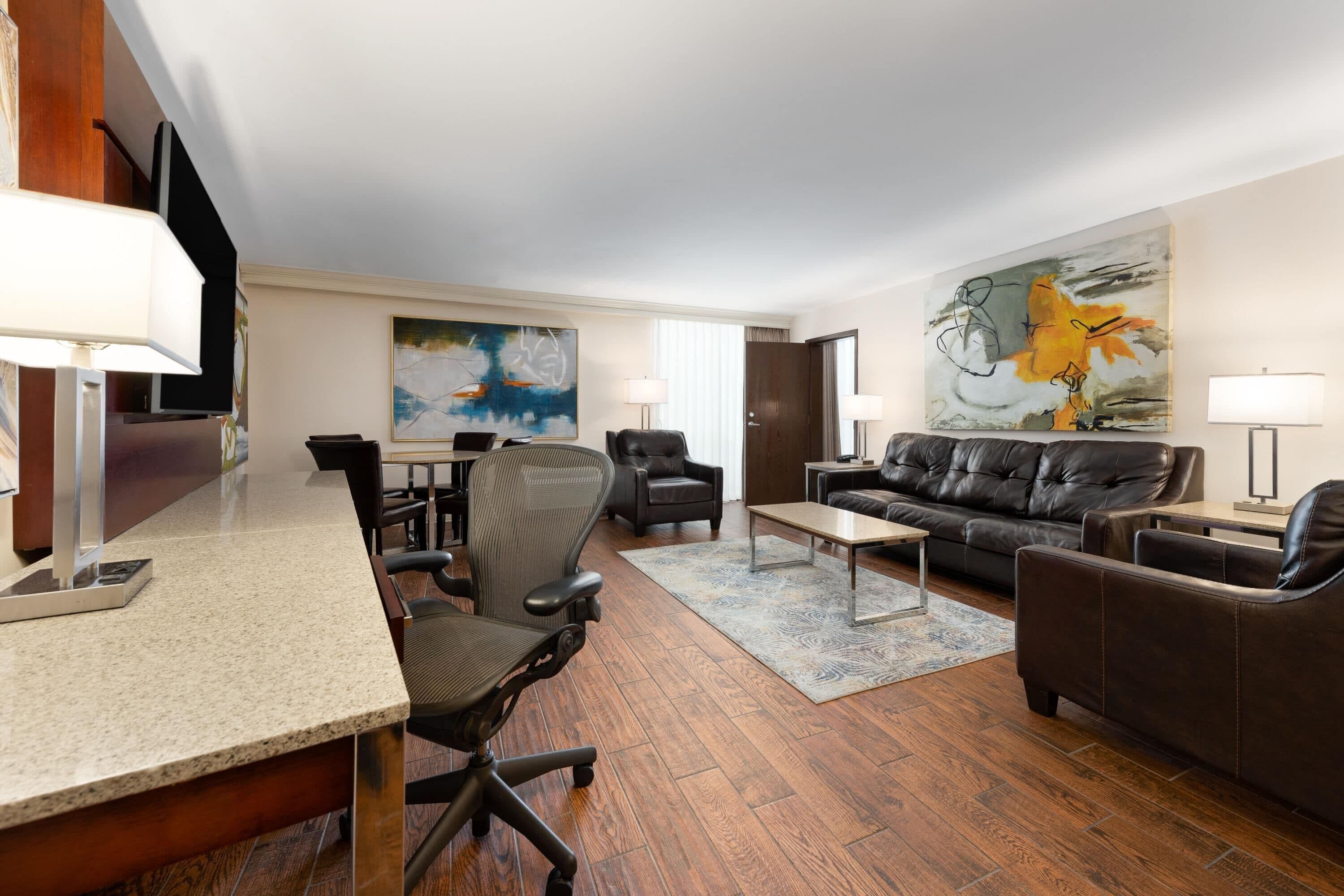 Deluxe Suite, 1 King Bed, Non Smoking (One-Bedroom Suite) | Living area | 55-inch Smart TV with satellite channels, Netflix, streaming services