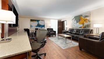 Deluxe Suite, 1 King Bed, Non Smoking (One-Bedroom Suite) | Living area | 55-inch Smart TV with satellite channels, Netflix, streaming services