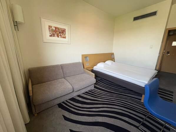 Down duvets, desk, blackout curtains, free WiFi