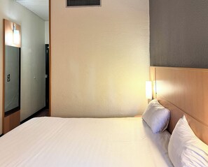 Down comforters, desk, blackout drapes, free WiFi