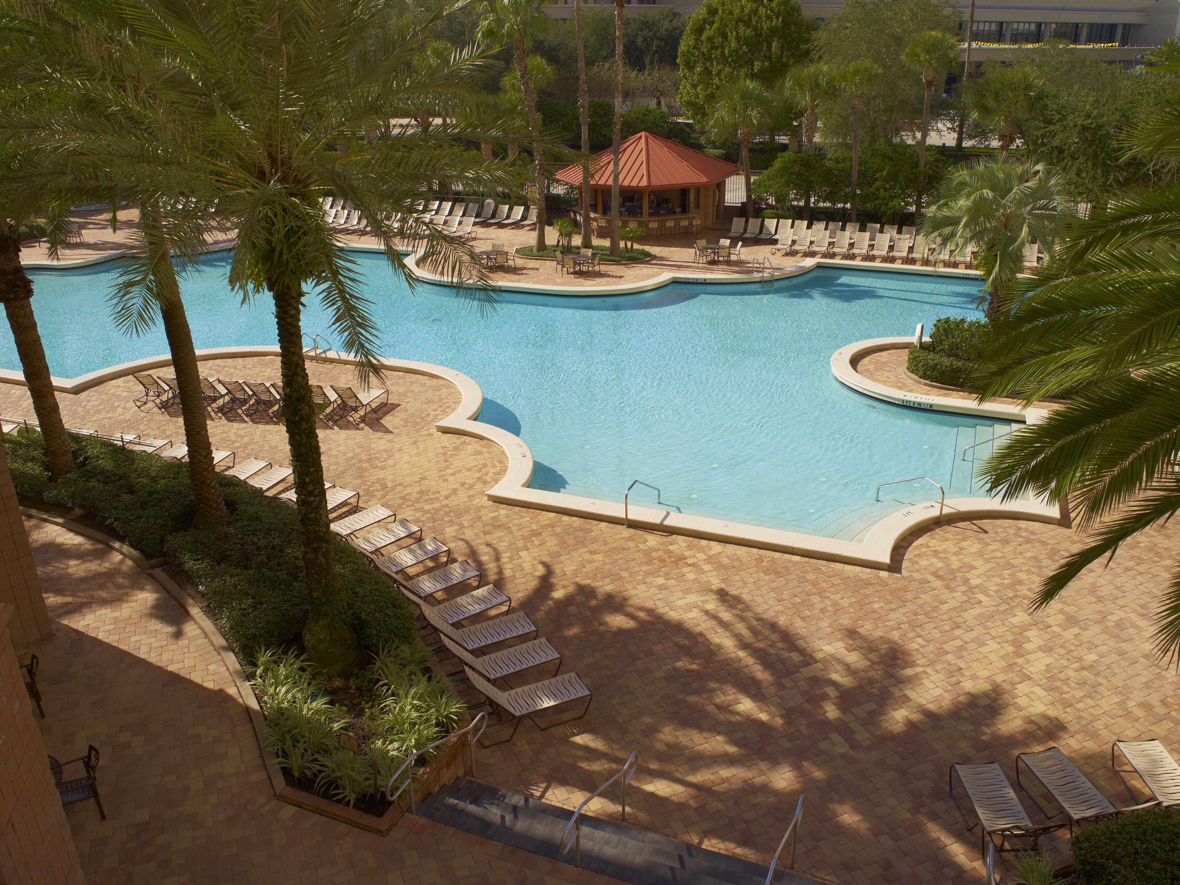 outdoor pool, open 6:00 am to midnight, pool umbrellas, pool loungers