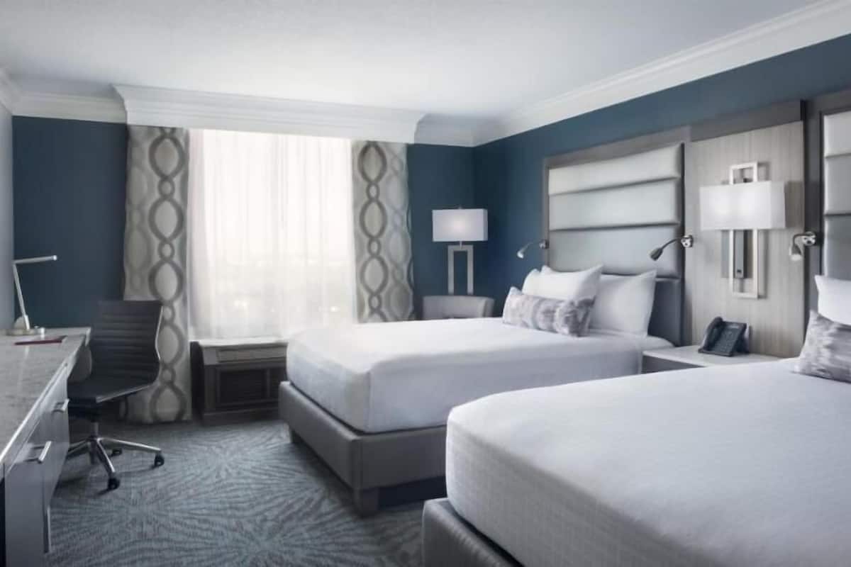 Premium bedding, pillow-top beds, in-room safe, desk