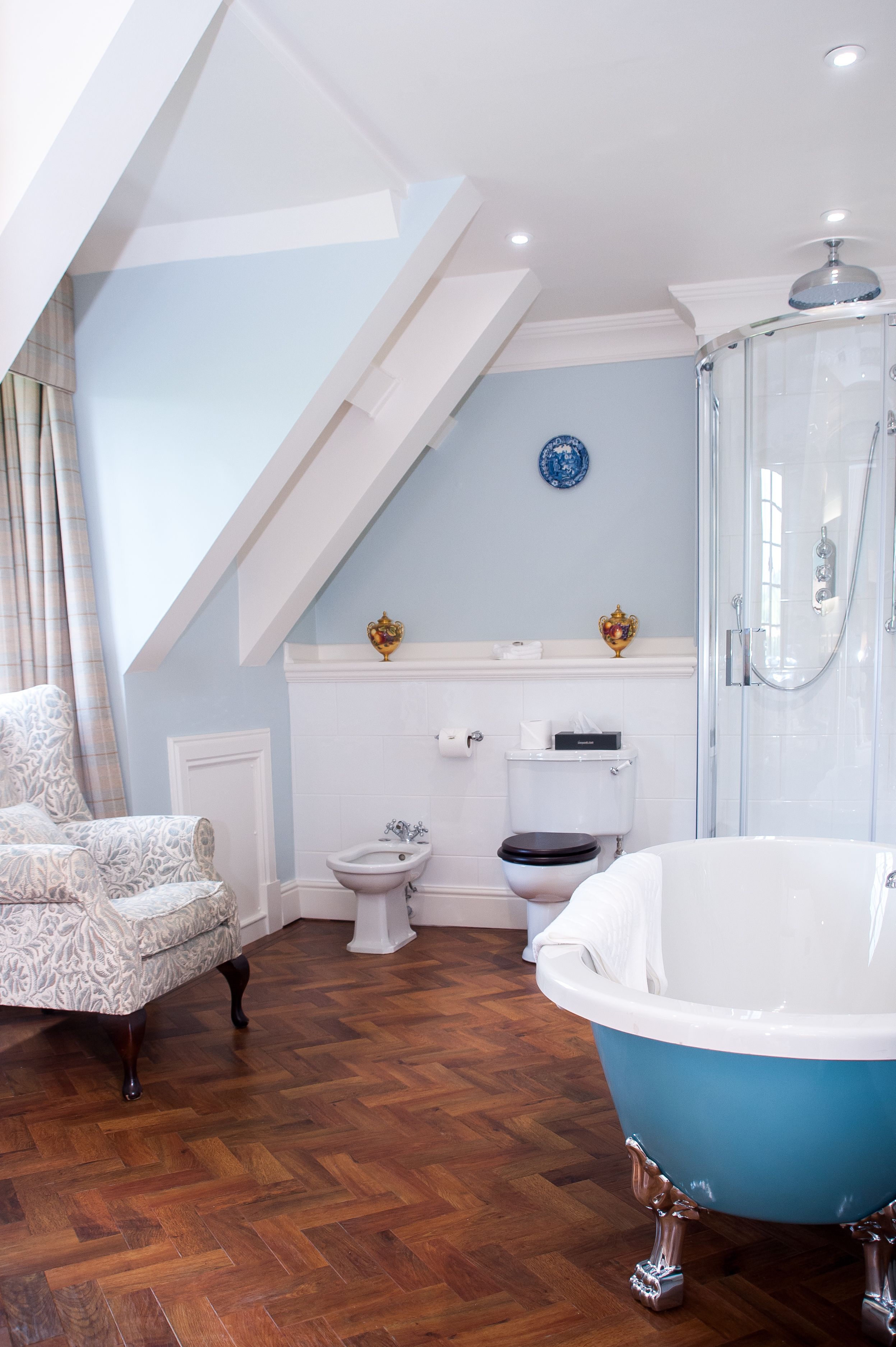 separate bathtub and shower, deep-soaking bathtub, rainfall showerhead