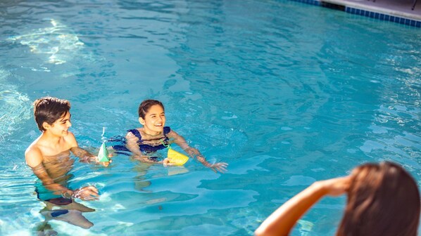 Outdoor pool, pool umbrellas, pool loungers