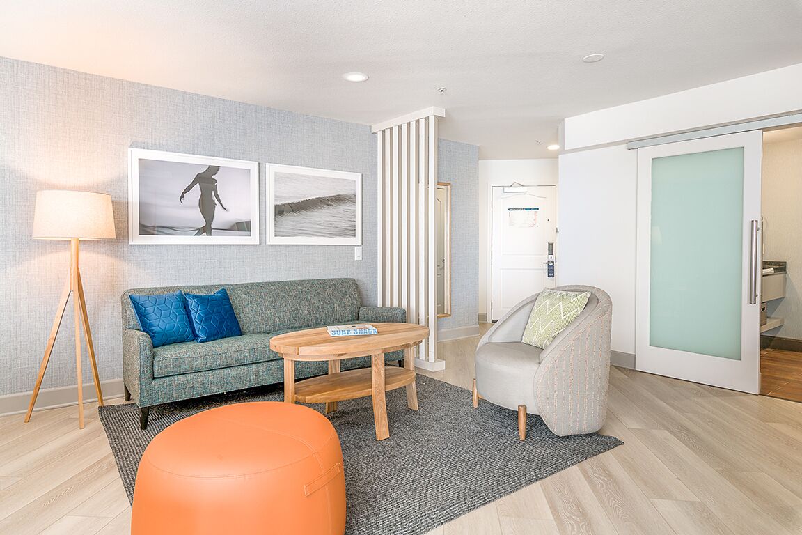 room, 2 queen beds, balcony, ocean view | living area | led tv, ipod dock, streaming services