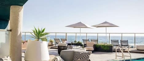 Outdoor pool, pool umbrellas, pool loungers