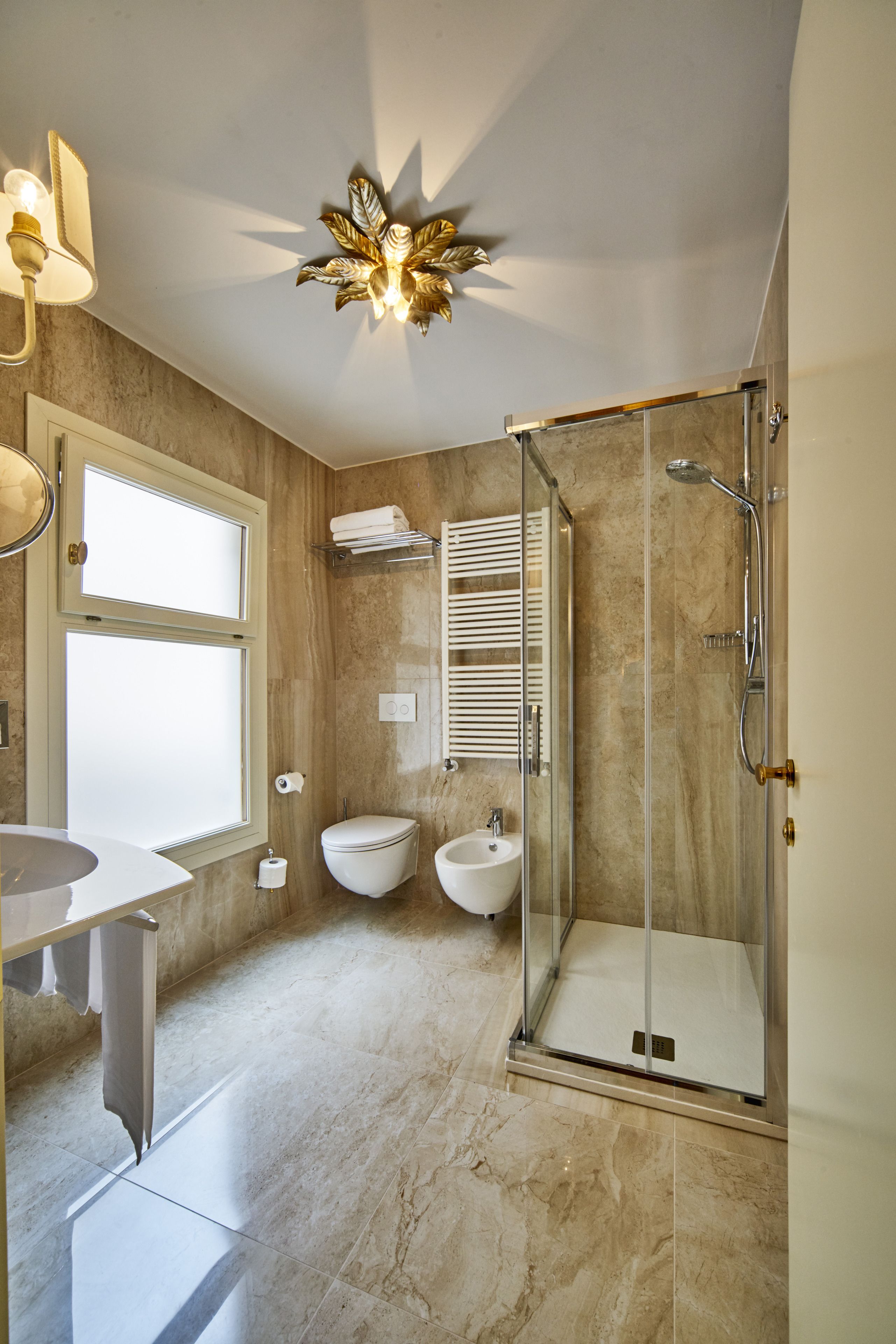 hair dryer, bidet, towels