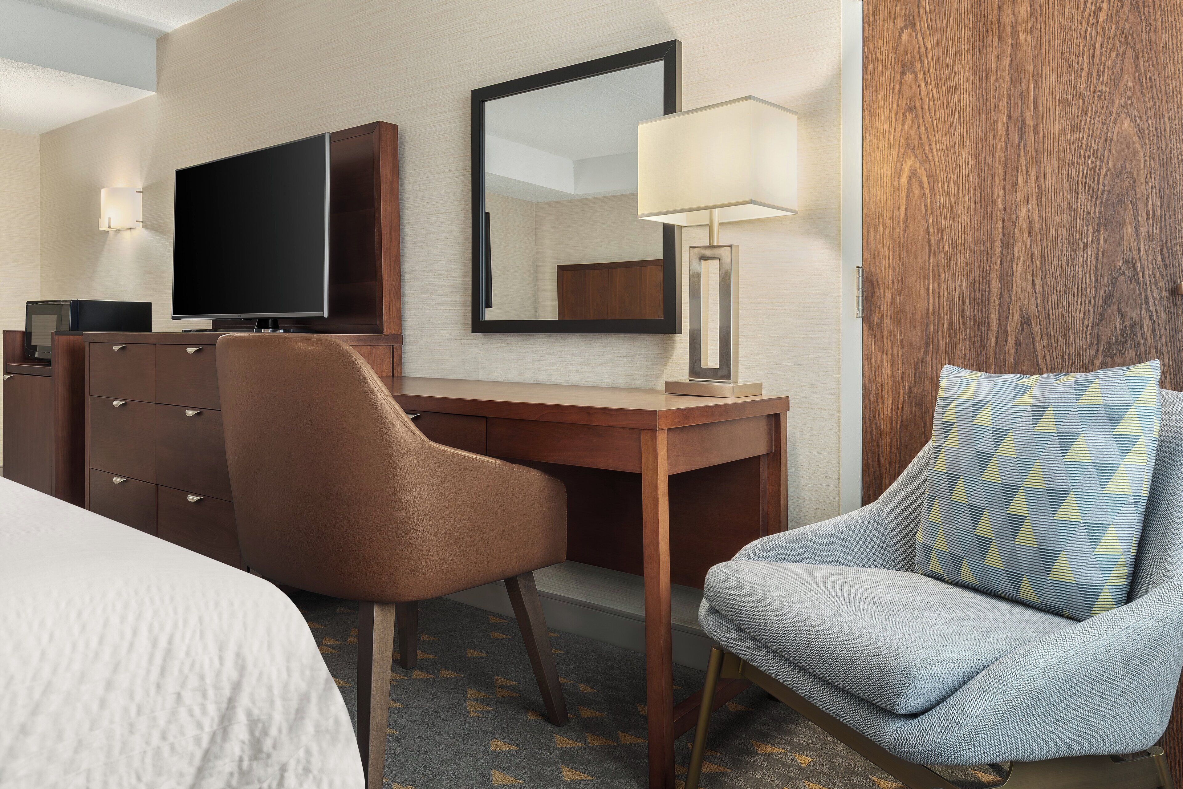 Pillowtop beds, desk, blackout drapes, iron/ironing board