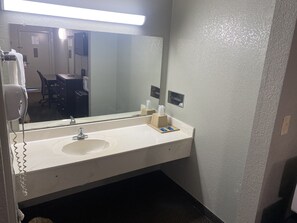 Bathtub, free toiletries, hair dryer, towels