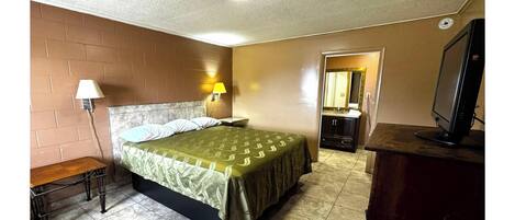 Chambre, 1 trĂšs grand lit, fumeur | Bureau, espace de travail pour ordinateurs portables