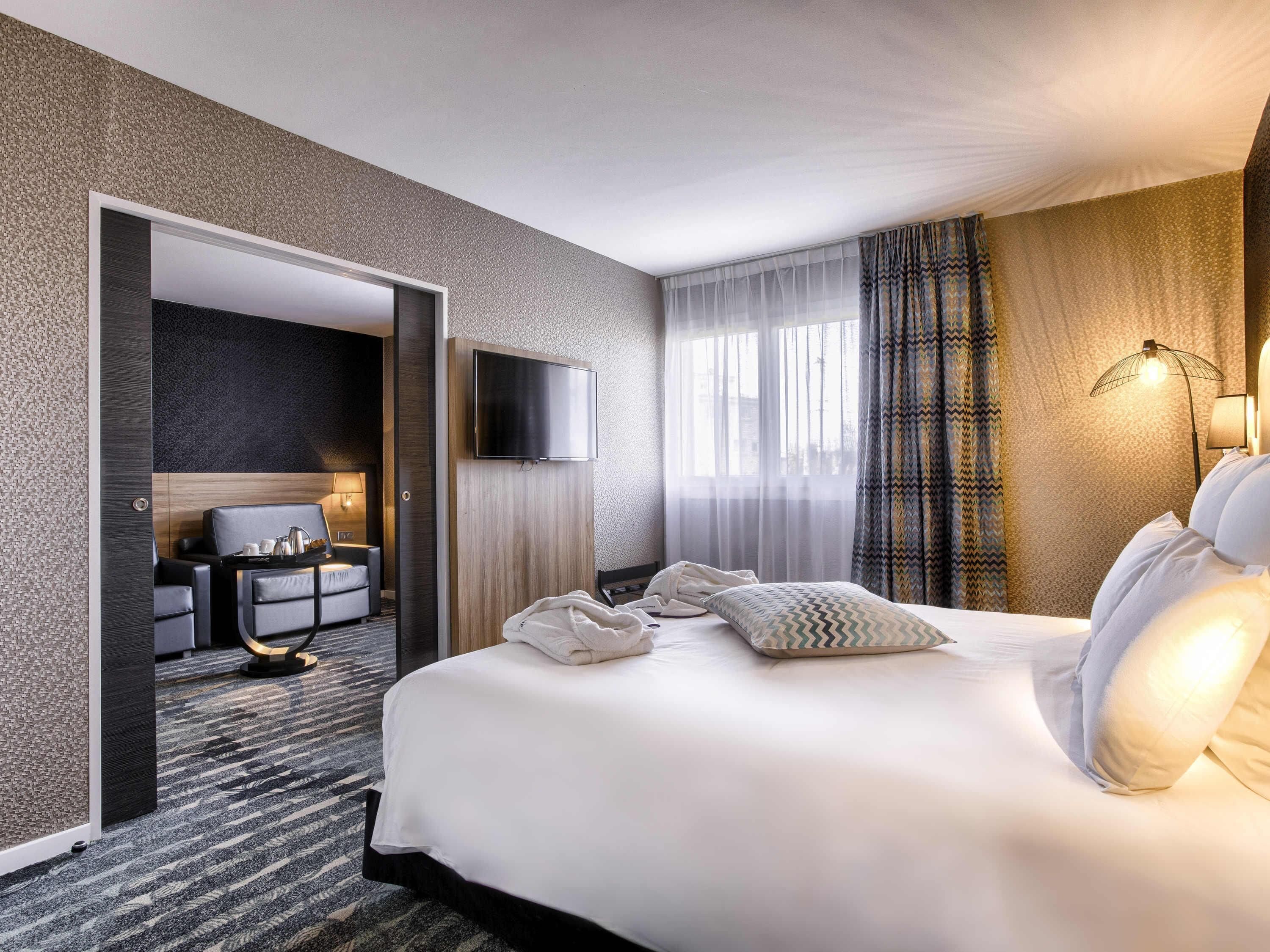 In-room safe, desk, blackout curtains, iron/ironing board