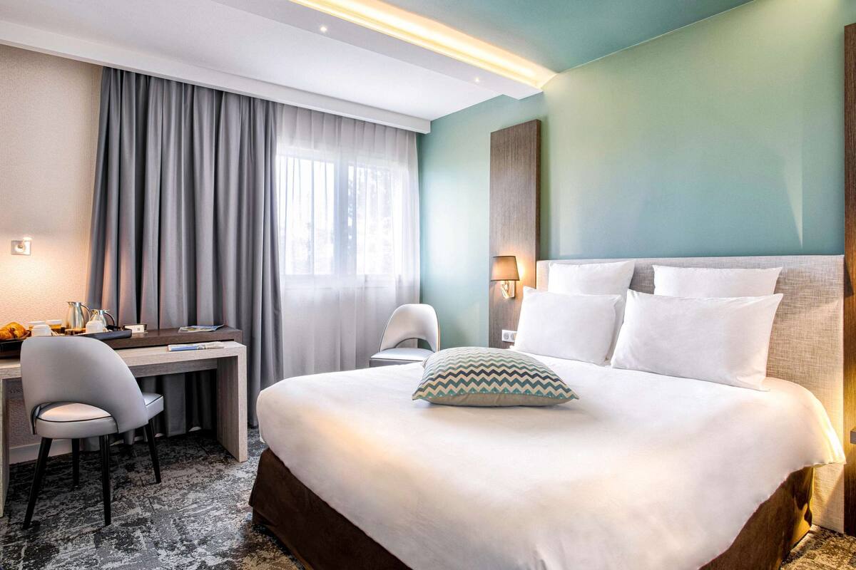 In-room safe, desk, blackout drapes, iron/ironing board
